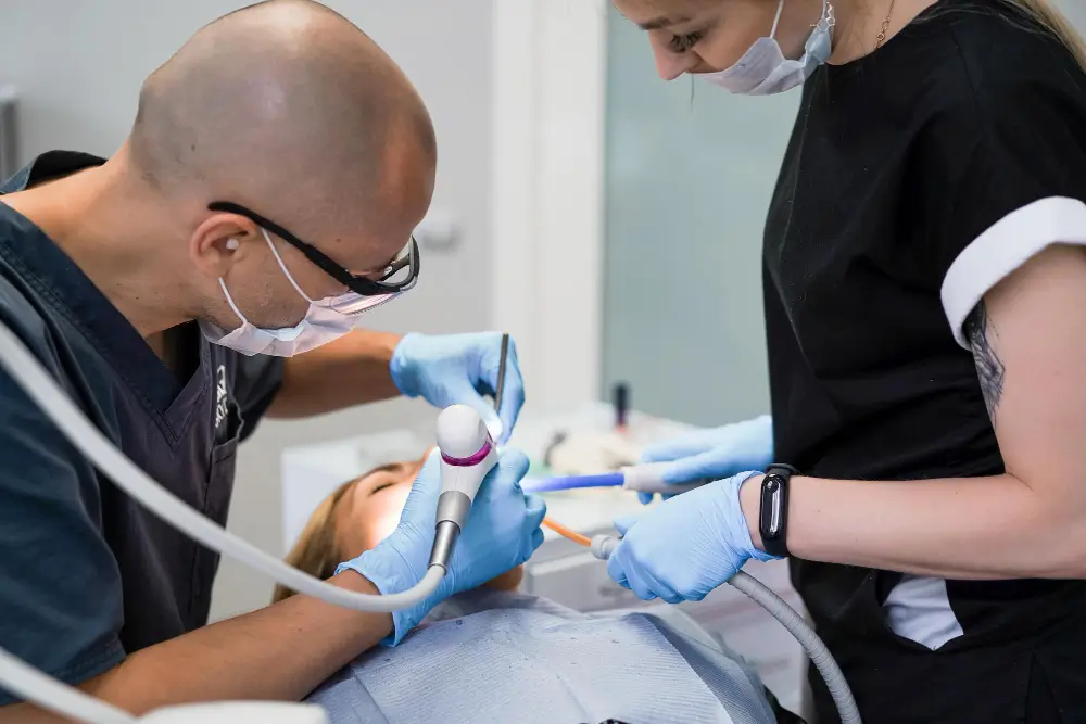 Emergency dentist in Woodland CA — Dr. Singh treating a patient at SpringLake Dental