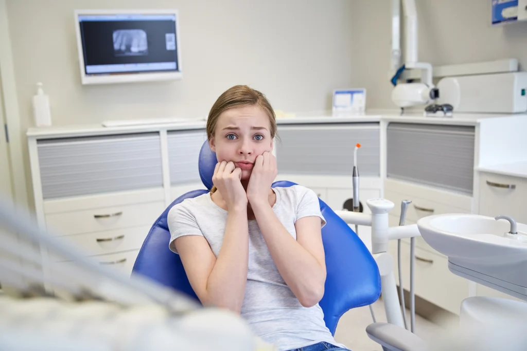 Severe Tooth Pain in Woodland CA – When to Visit an Emergency Dentist 1 Emergency dentist treating severe tooth pain in Woodland CA